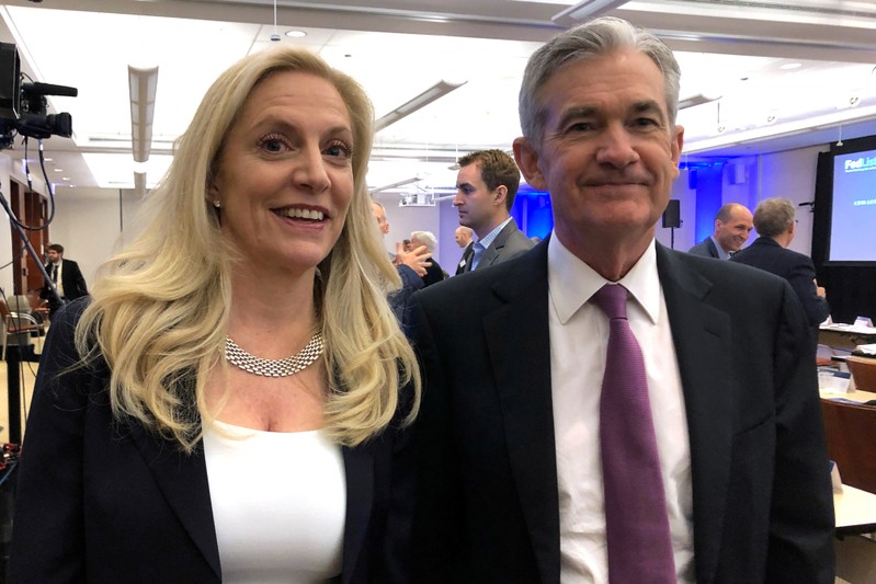 FILE PHOTO: Federal Reserve Chairman Jerome Powell poses for photos with Fed Governor Lael