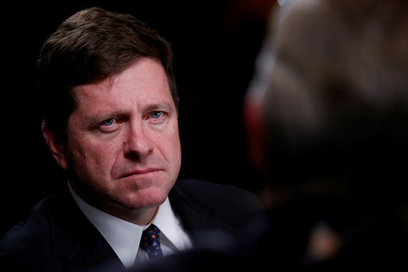 FILE PHOTO: Jay Clayton, Chairman of the Securities and Exchange Commission, listens during an