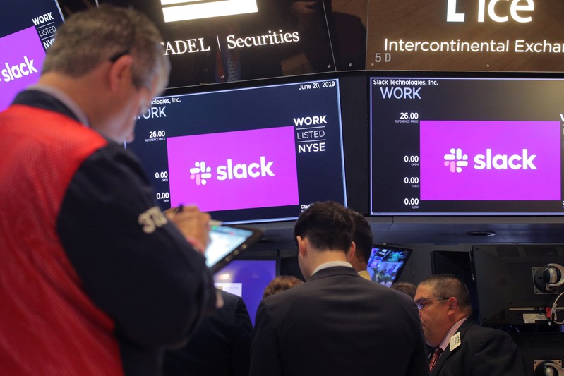 Traders work on the floor during The Slack Technologies Inc. IPO at the New York Stock Exchange