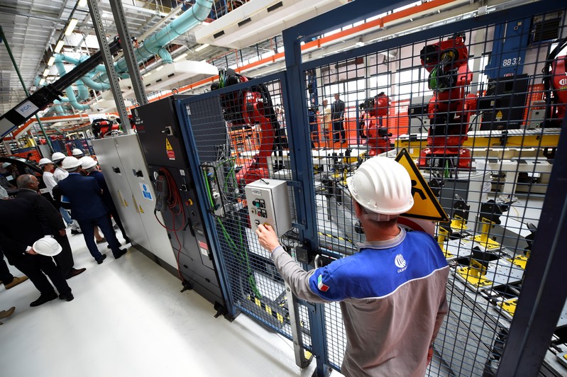 Ceremony to mark the installation of the first robot on the production line for the new