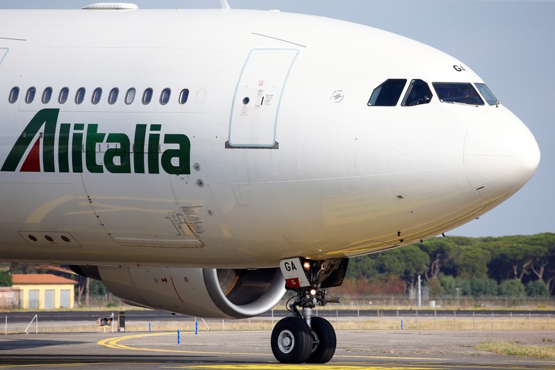 An Alitalia airplane is seen before take off from the Leonardo da Vinci-Fiumicino Airport in