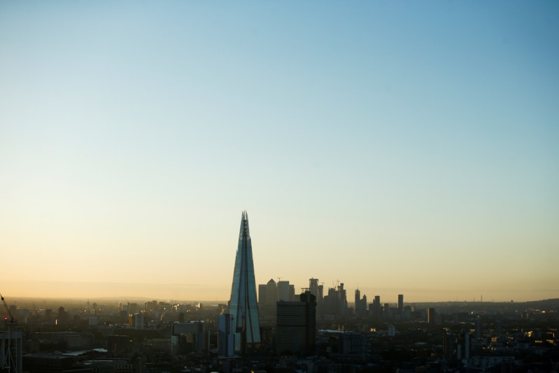 FILE PHOTO: The London skyline can be seen during sunrise on the day of the Summer Solstice,