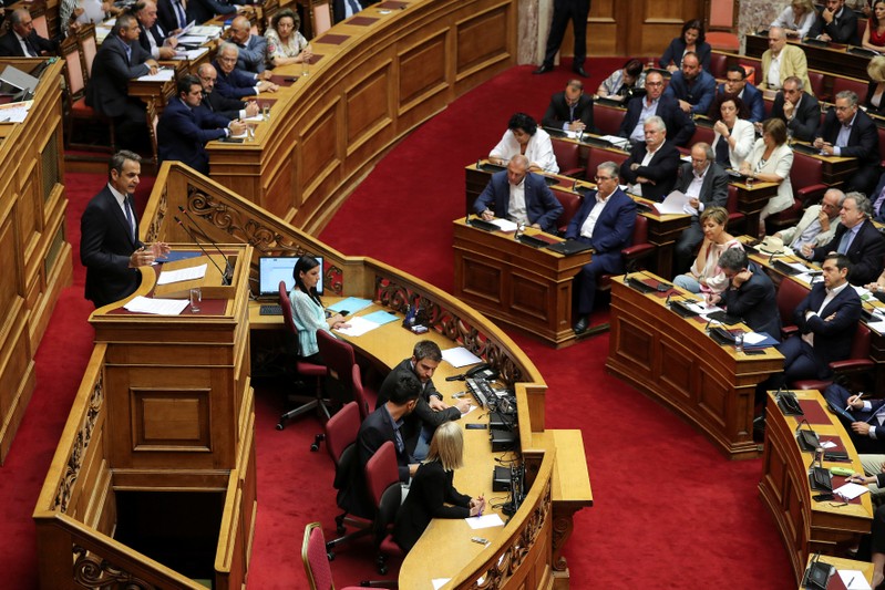 Greek PM Mitsotakis presents his government's main policies as Syriza party leader Tsipras