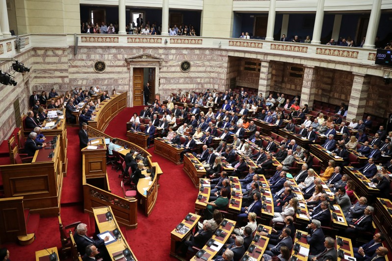 Greek PM Mitsotakis presents his government's main policies during a parliamentary session in