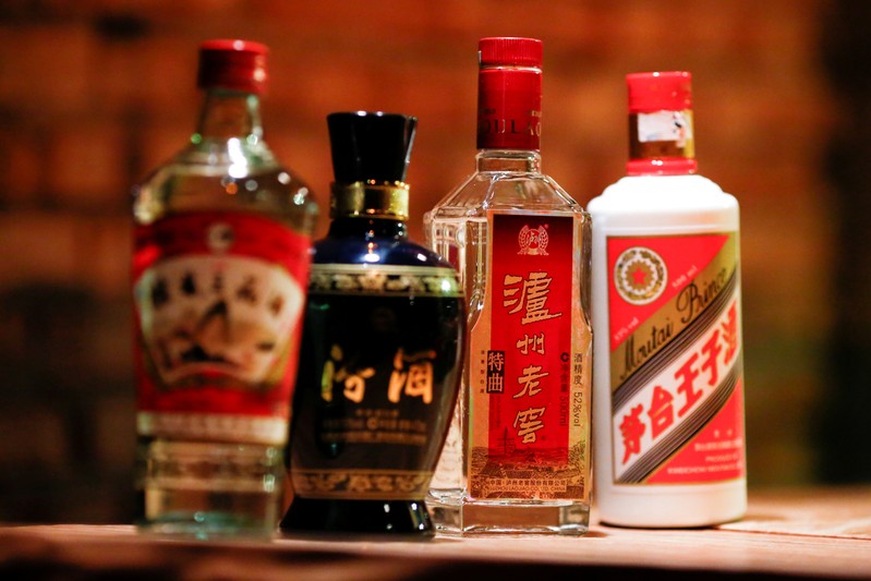 FILE PHOTO: Bottles of the Chinese spirit baijiu are on display at a bar in Beijing