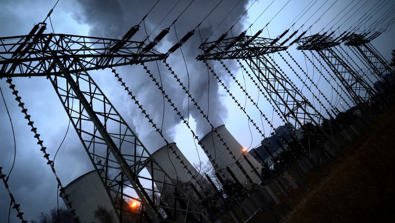 FILE PHOTO: Water vapour rises from the cooling towers of the Jaenschwalde lignite-fired power