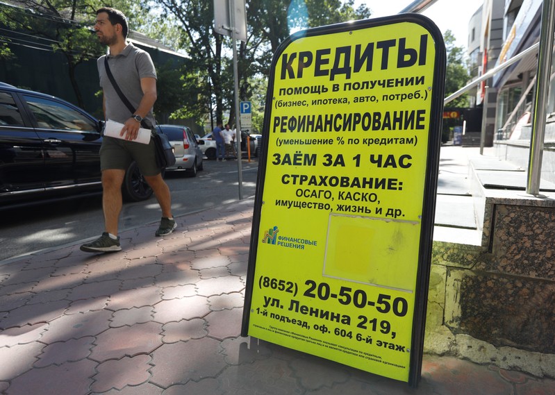An advertising board of a lending agency is on display in Stavropol