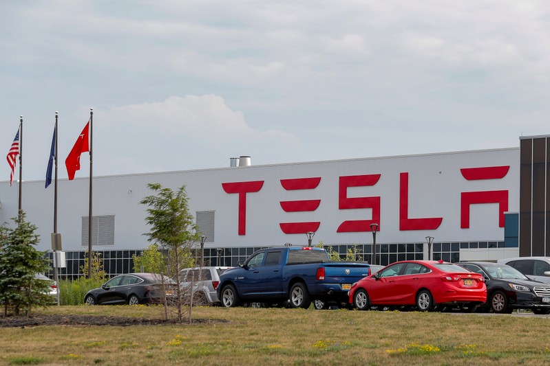 Flags fly over the Tesla Inc. Gigafactory 2, which is also known as RiverBend, a joint venture