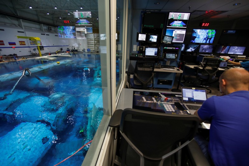A control center looking out over the water at NASA's Neutral Buoyancy Laboratory (NBL)