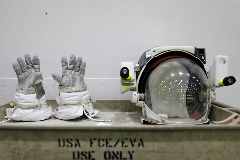 The gloves and helmet of NASA Commercial Crew astronaut Sunita William's space suit are shown