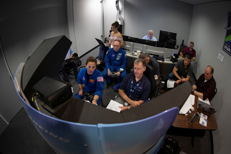 NASA commercial crew astronauts Nicole Mann and Mike Fincke and Boeing astronaut Chris Ferguson