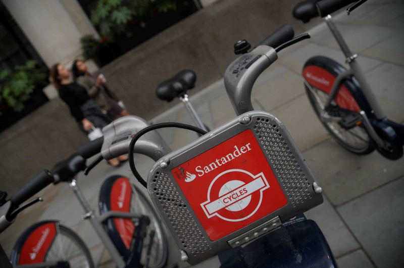The logo of Santander bank is seen on rental bicycles in the City of London financial district