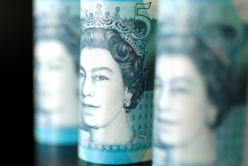 British five pound banknotes are seen in this picture illustration