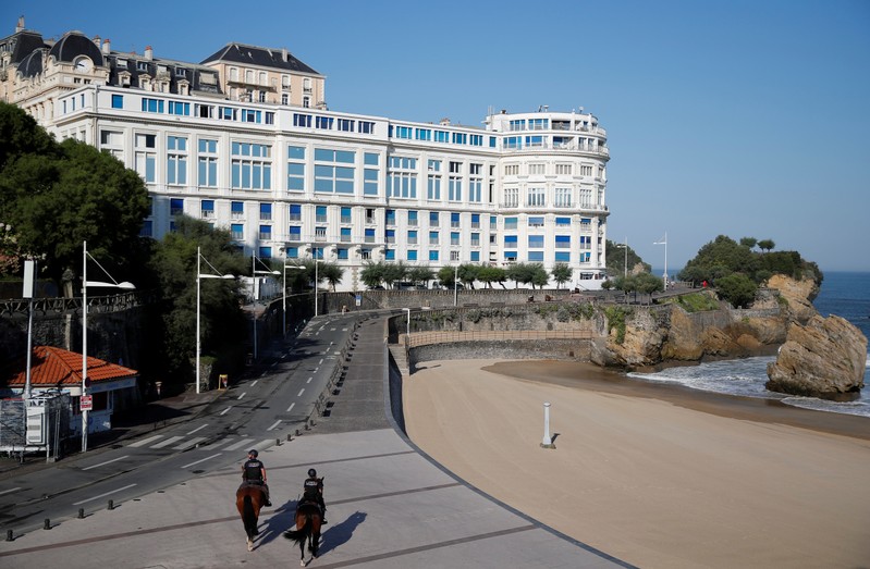 Policemen patrol in front of the Bellevue summit venue ahead of the G7 summit in Biarritz