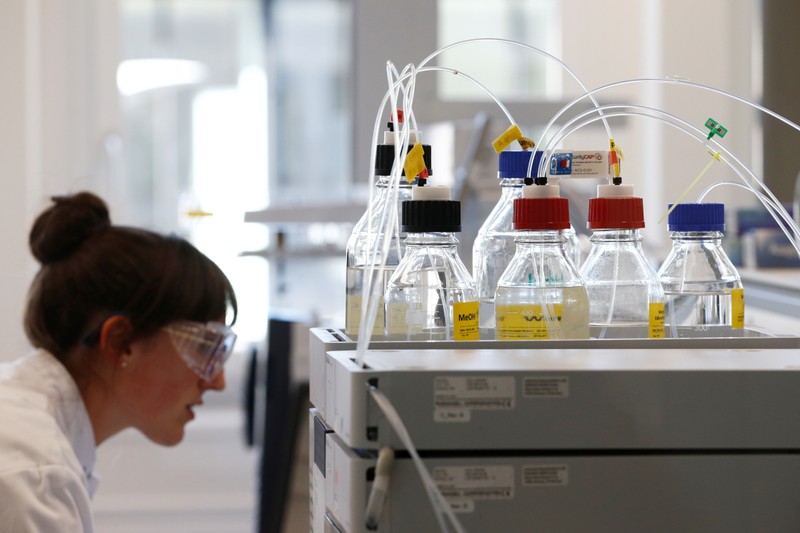 A staff works in a laboratory during a media visit for the inauguration of the Nestle Institute