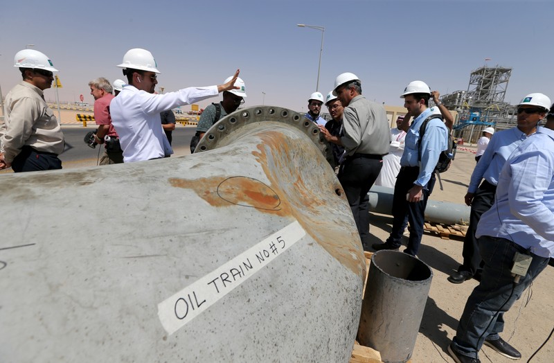 A damaged pipeline is seen at Saudi Aramco oil facility in Khurais