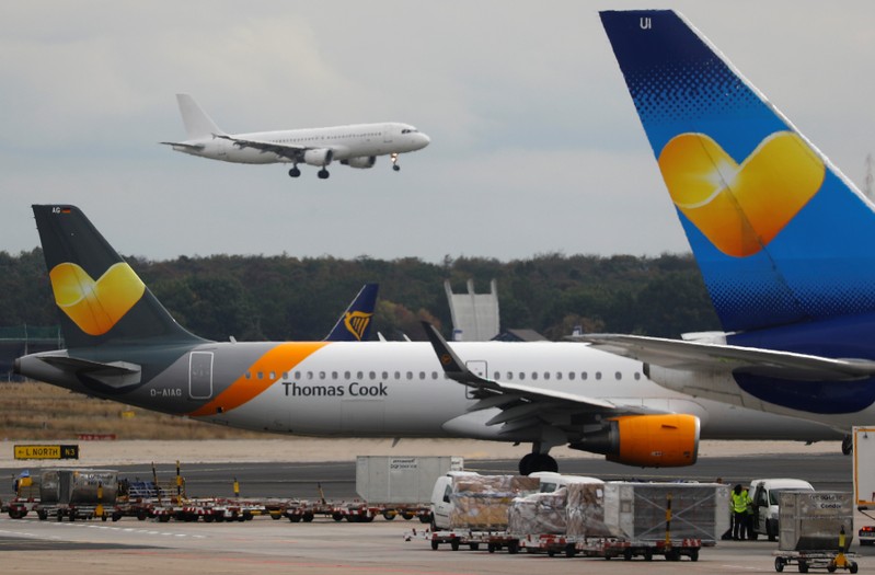 Airplanes with the logos of air carrier Condor by Thomas Cook are seen at the airport  in