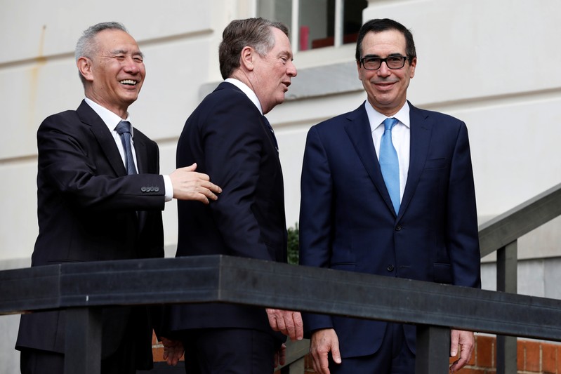U.S. Treasury Secretary Steve Mnuchin greets China's Vice Premier Liu He