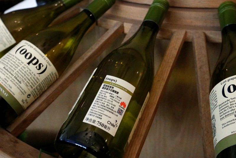 Wines with Huawei logo on the label are displayed for sale at a Huawei Mossel shop in Huawei's