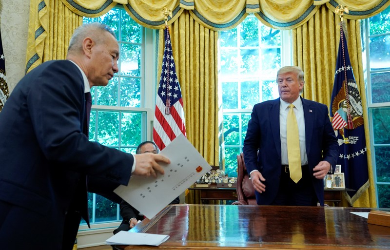 China's Vice Premier Liu speaks with U.S. President Trump during a meeting at the White House