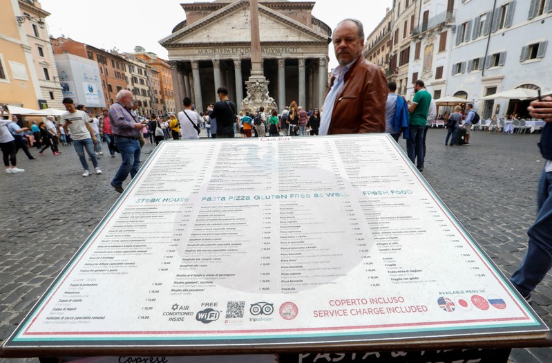Restaurant's menu is seen in downtown Rome as Italy's cabinet prepares to approve a 2020 budget