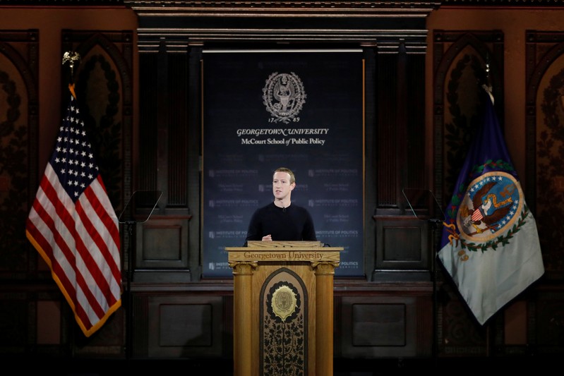 Facebook Chairman and CEO Mark Zuckerberg addresses the audience in Georgetown University's