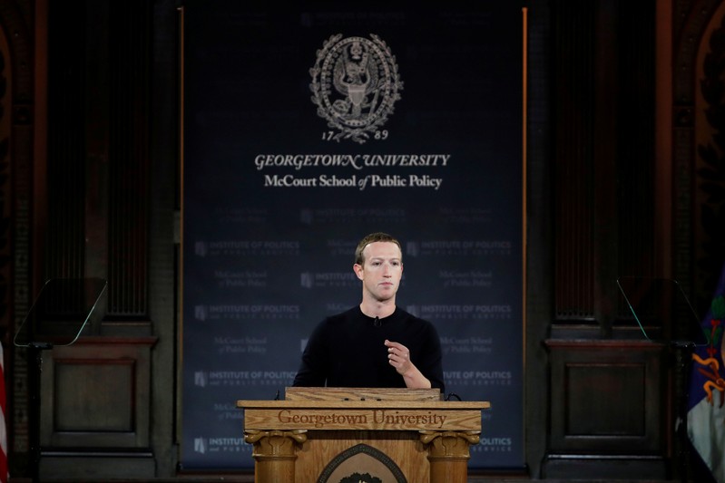 Facebook Chairman and CEO Mark Zuckerberg addresses the audience in Georgetown University's