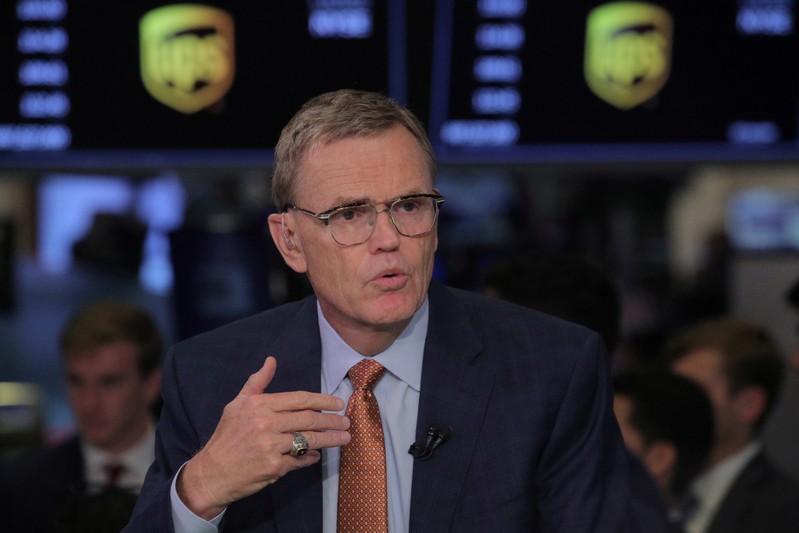 FILE PHOTO: David Abney, chairman and CEO of United Parcel Service (UPS), speaks during an