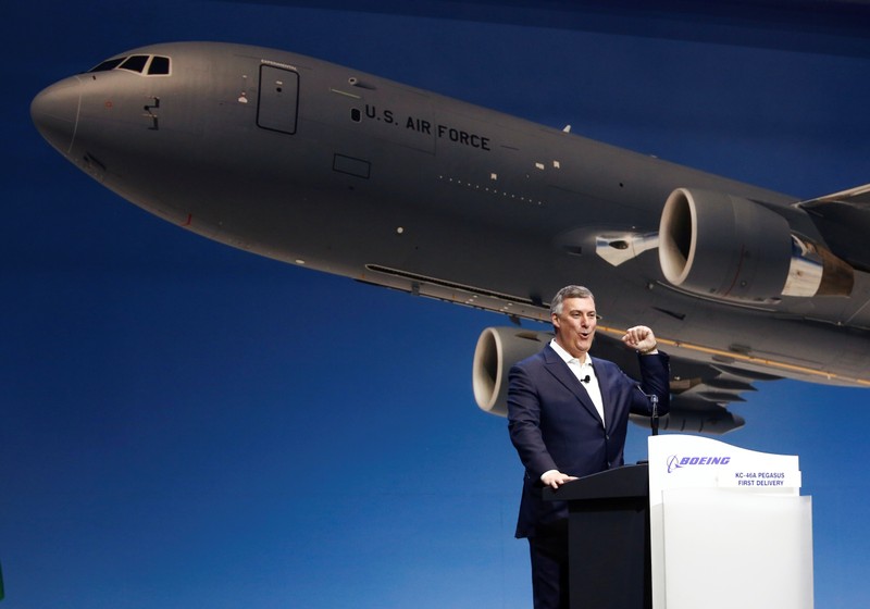 President and CEO of Boeing Commercial Airplanes McAllister cheers during a delivery