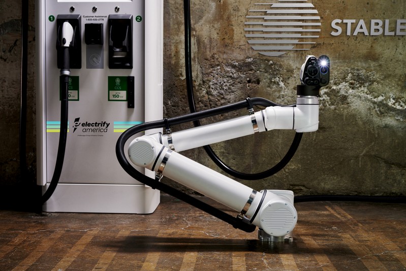 Charging facility for autonomous vehicles using Stable robotics and an Electrify America