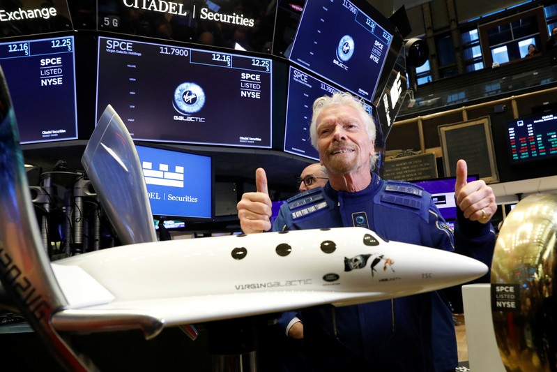 Sir Richard Branson poses on floor of New York Stock Exchange (NYSE) ahead of Virgin Galactic