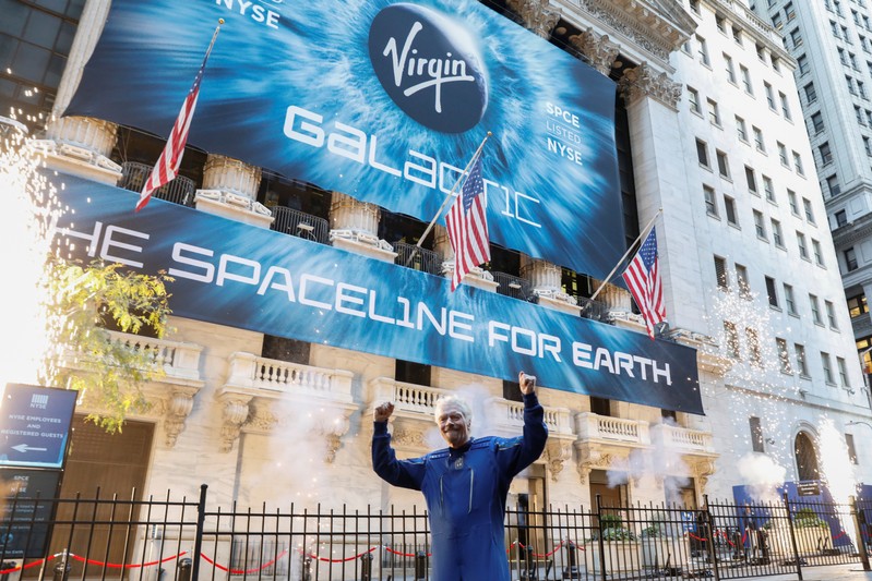 Sir Richard Branson poses outside of the New York Stock Exchange (NYSE) ahead of Virgin