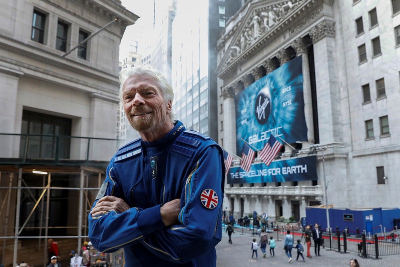 Sir Richard Branson poses outside of the New York Stock Exchange (NYSE) ahead of Virgin