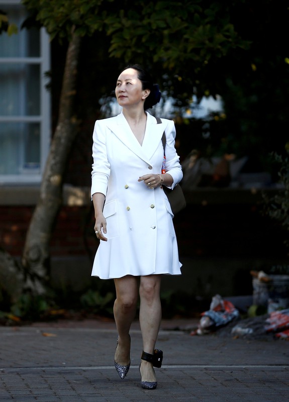 FILE PHOTO: Huawei Technologies Chief Financial Officer Meng Wanzhou leaves her home to appear