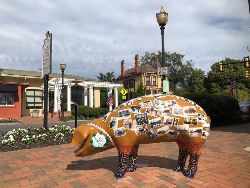A sculpture of a pig is seen in downtown Smithfield