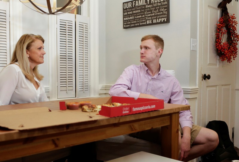 William Smith and his mother Kristen Smith are interviewed by Reuters in Newburyport