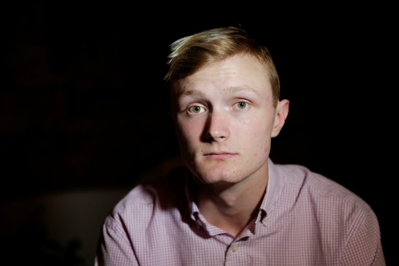William Smith poses for a portrait at his home in Newburyport