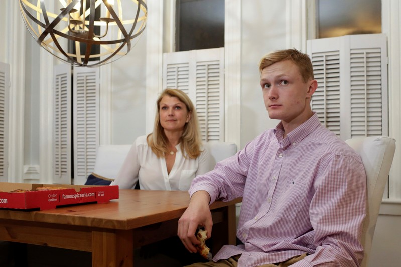 William Smith and his mother Kristen Smith are interviewed by Reuters in Newburyport