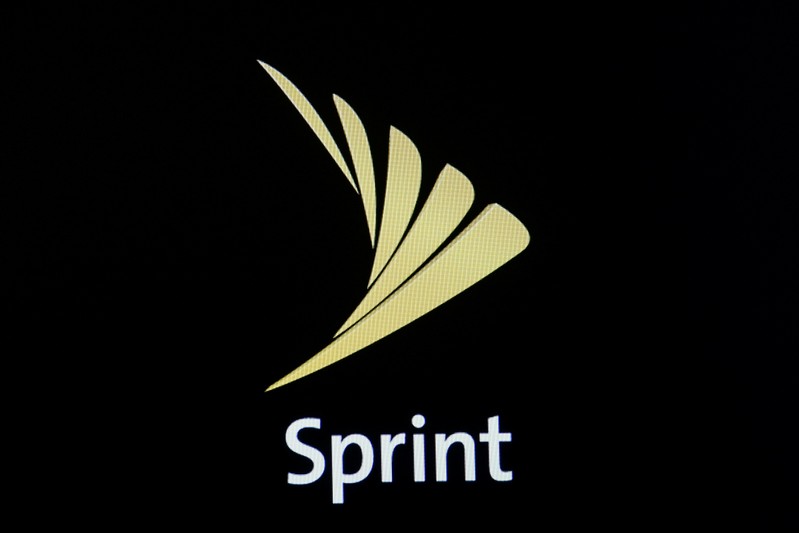 The Sprint logo is displayed on a a screen on the floor of the NYSE in New York City