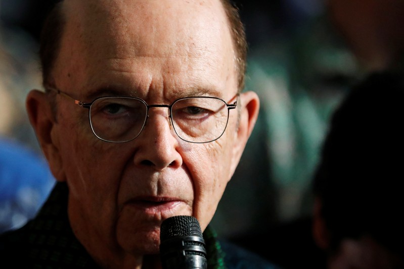 U.S. Commerce Secretary Wilbur Ross talks to journalists during a press briefing with