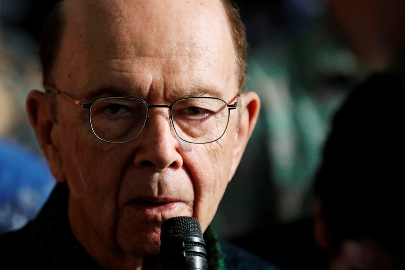 U.S. Commerce Secretary Wilbur Ross talks to journalists during a press briefing with