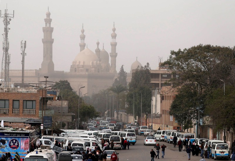 FILE PHOTO: The minarets of Sultan Hassan Mosque and the Al-Rifa'i Mosque are seen as a traffic