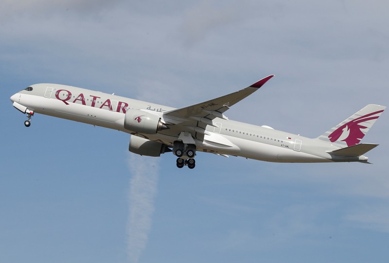 A Qatar Airways aircraft takes off at the aircraft builder's headquarters of Airbus in