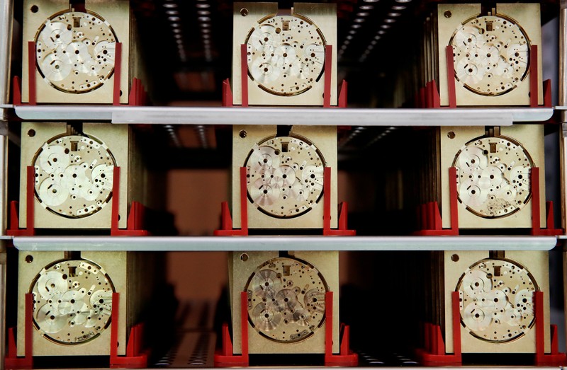 FILE PHOTO: Movement plates for watches of Swiss watch manufacturer IWC are seen at its new