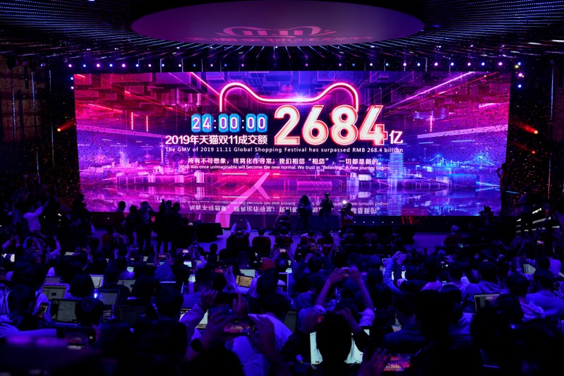 Screen shows the value of goods being transacted during Alibaba Group's Singles' Day global