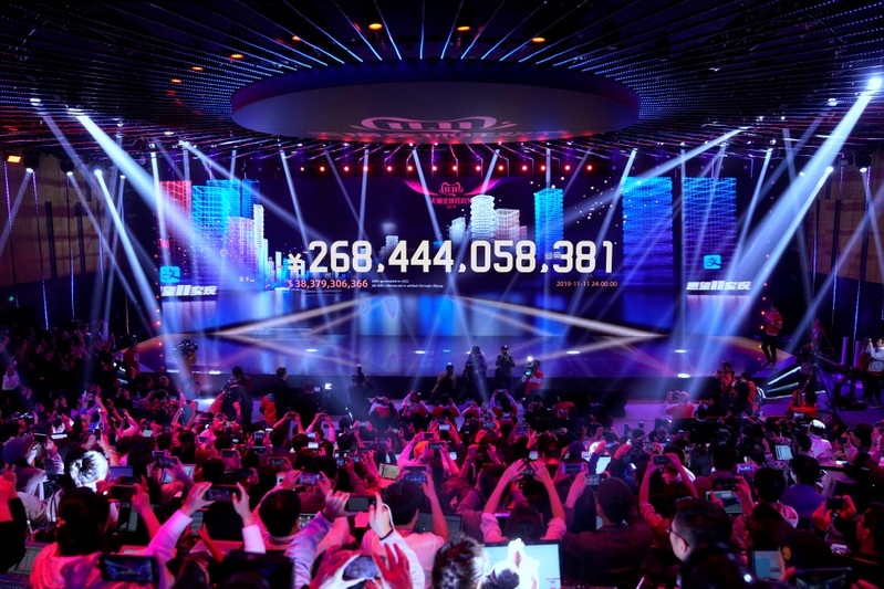 Screen shows the value of goods being transacted during Alibaba Group's Singles' Day global