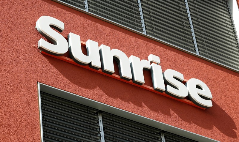 FILE PHOTO: Swiss telecom company Sunrise's logo is seen at an office building in Zurich