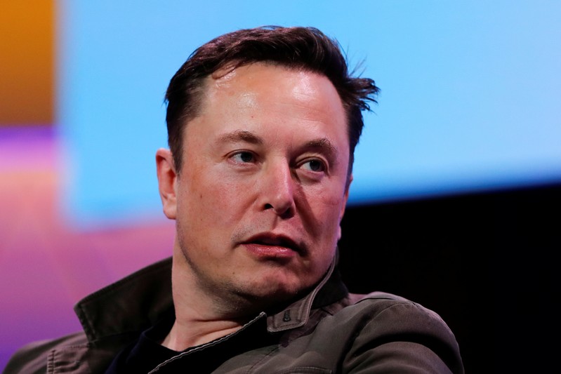 FILE PHOTO: SpaceX owner and Tesla CEO Elon Musk speaks during a conversation with legendary