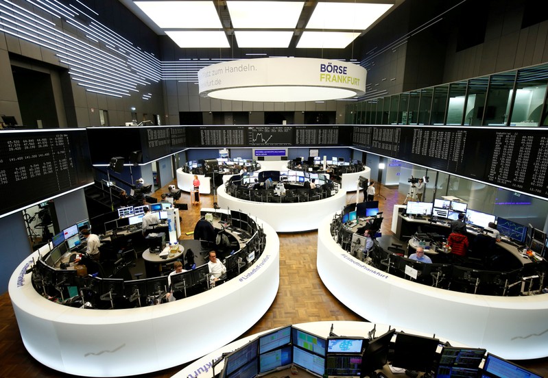FILE PHOTO: Traders work at Frankfurt's stock exchange in Frankfurt