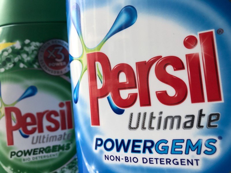 Ilustration photo shows containers of Unilever's Persil Ultimate Powergems Bio Detergent and